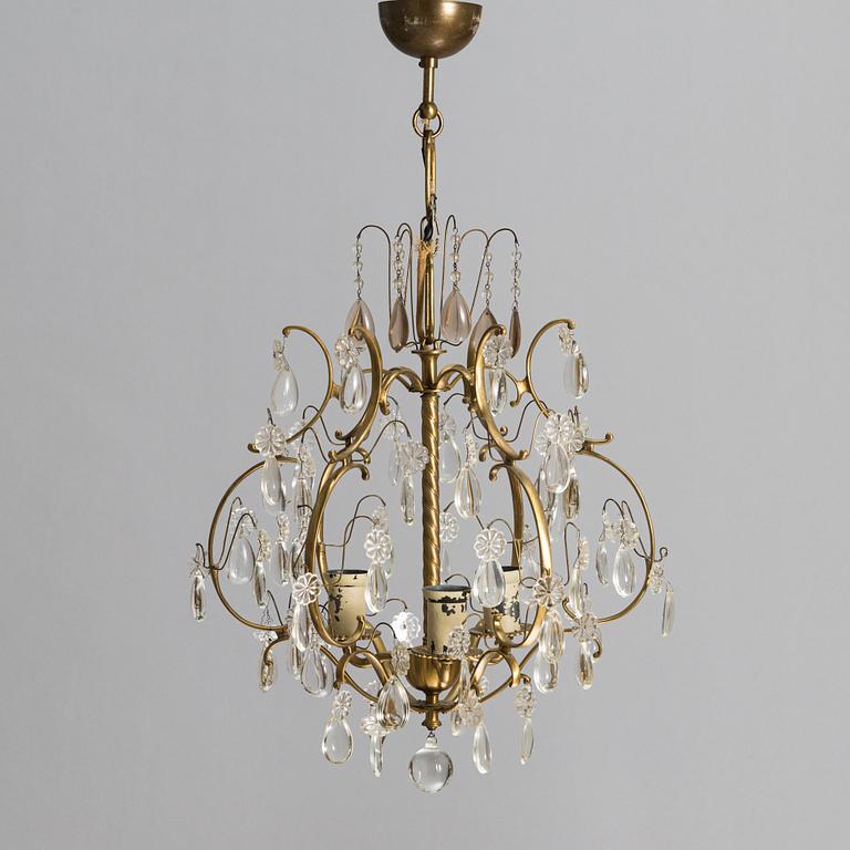 Paavo Tynell, a mid-20th century '1457/3' chandelier for Taito.