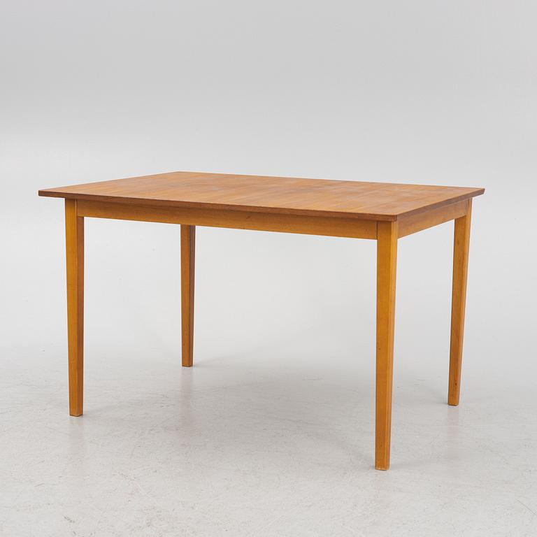 A teak-veneered dining table, 1960's/70's.