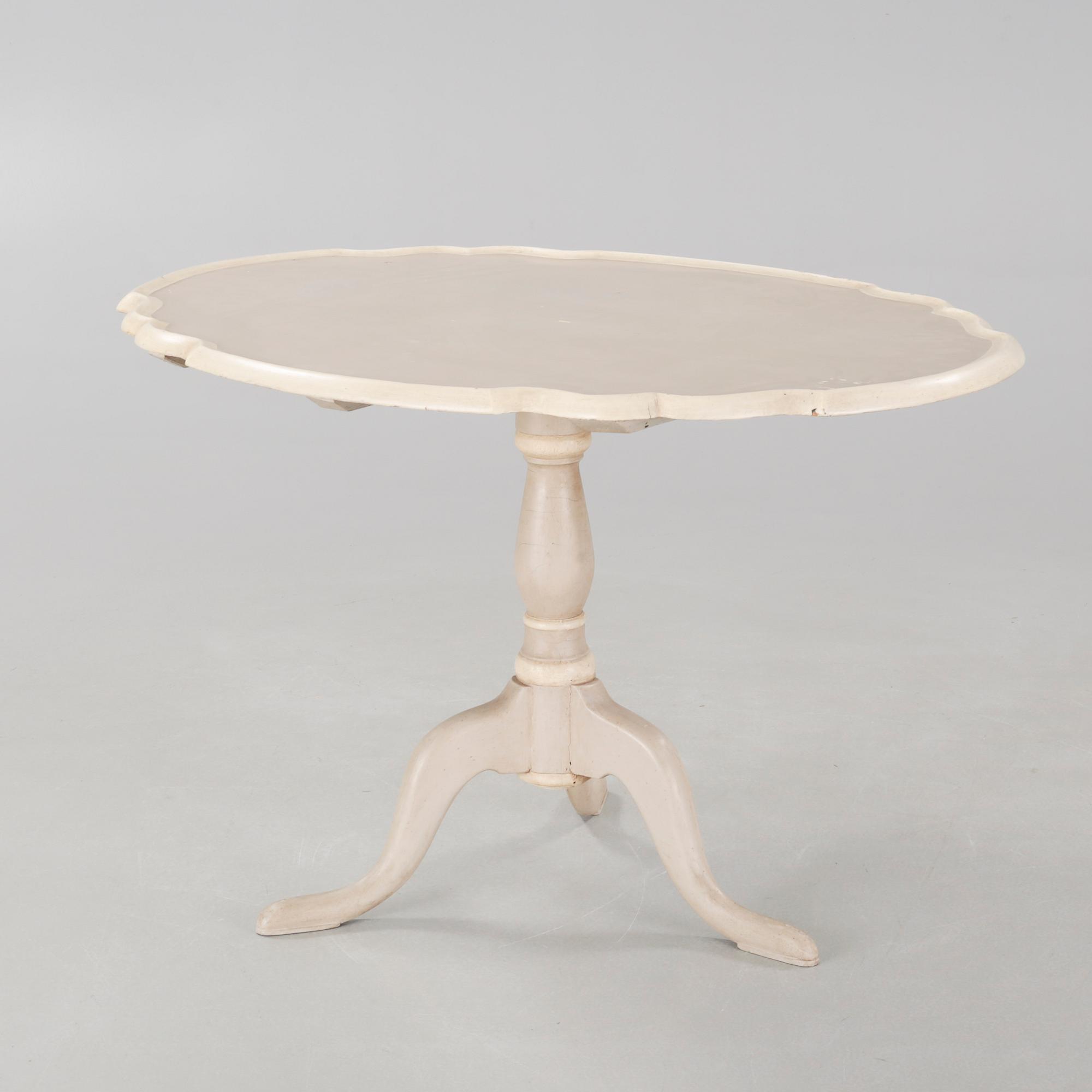 A late 19th century drop-leaf table.