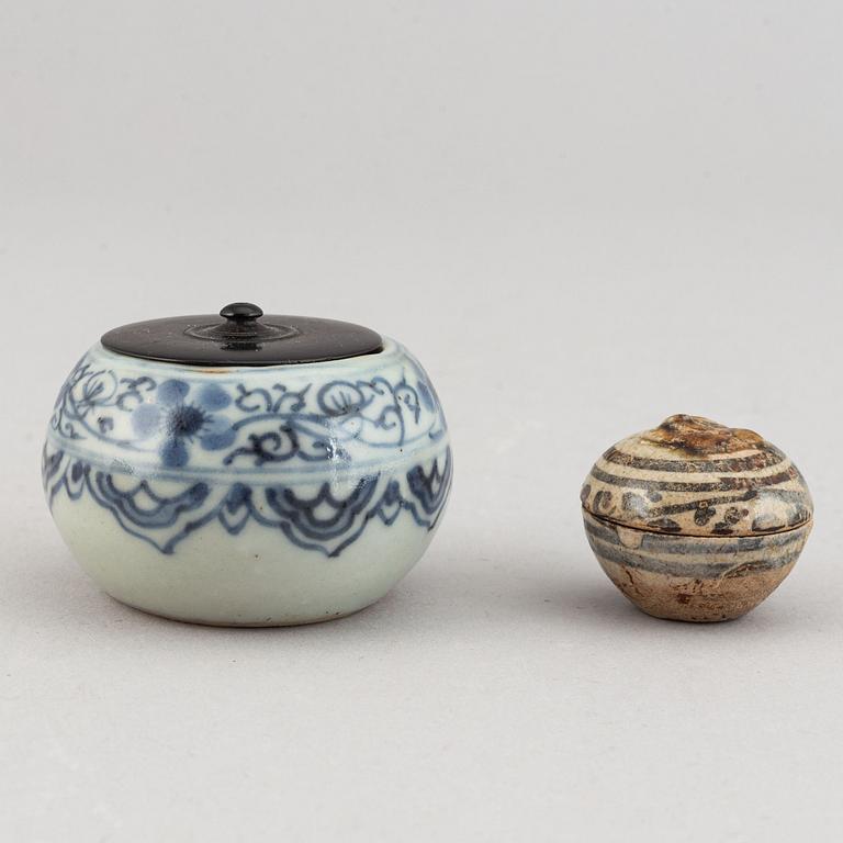 A group of two blue and white jars, one Korean, 19th century, the other Sawankalok, 13-14th century.