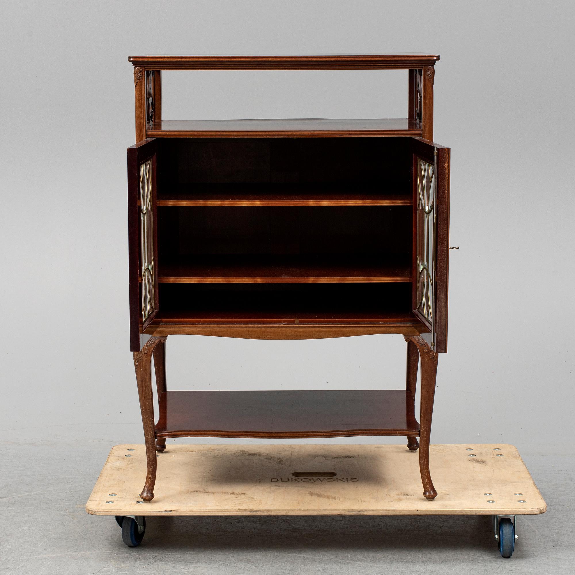 An early 20th Century art noveau cabinet by Myrstedt & Stern.