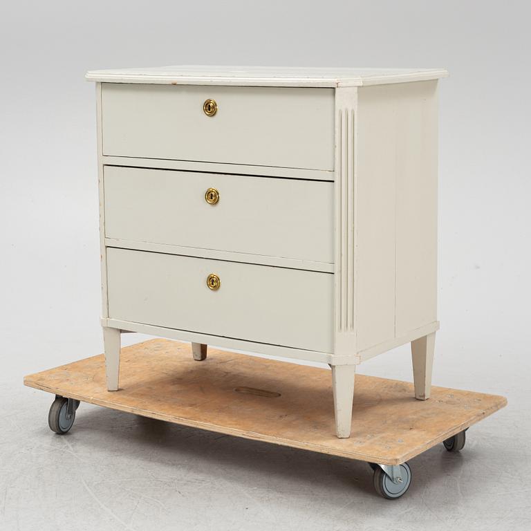 A Gustavian style chest of drawers, early 20th century.