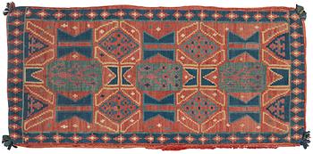 231. A carriage cushion, double-interlocked tapestry, c. 102 x 48 cm, Scania, Sweden, last quarter of the 18th century.