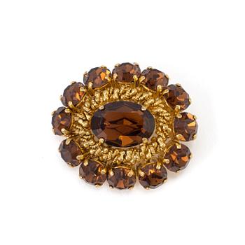 A brooch by Christian Dior from 1965.