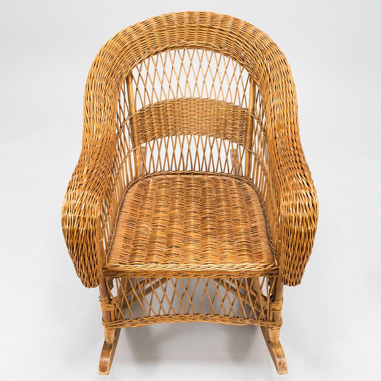 A mid-20th century rocking chair.