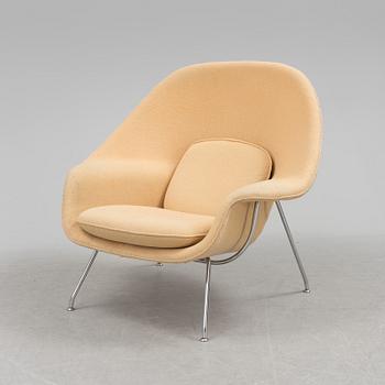 EERO SAARINEN, a "Womb chair" by knoll international.