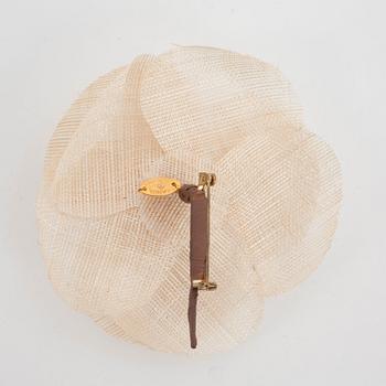 CHANEL a beige linnen camelia flower.