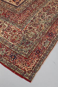 A carpet, an antique Kerman Laver, ca 677-688,5 x 510,5-526 cm.