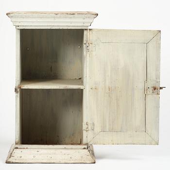 A Gustavian column-shaped cabinet, circa 1800.