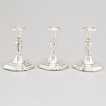 A set of three Swedish silver candlesticks, maker's mark CG Hallberg, Stockholm 1955-1957.