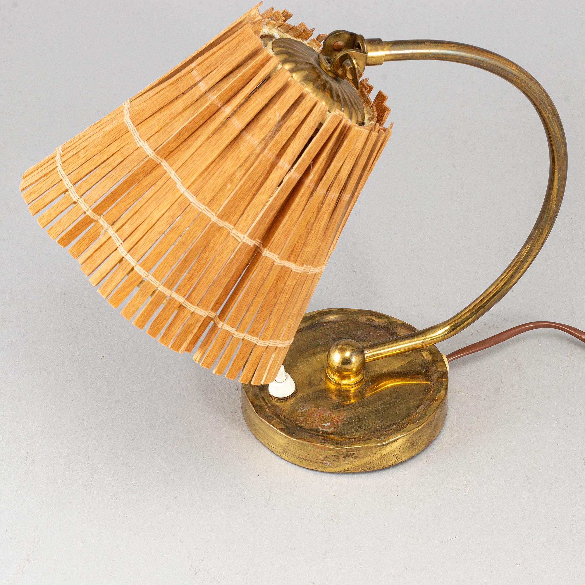 PAAVO TYNELL, a model 61032 table light from Idman, Finland.