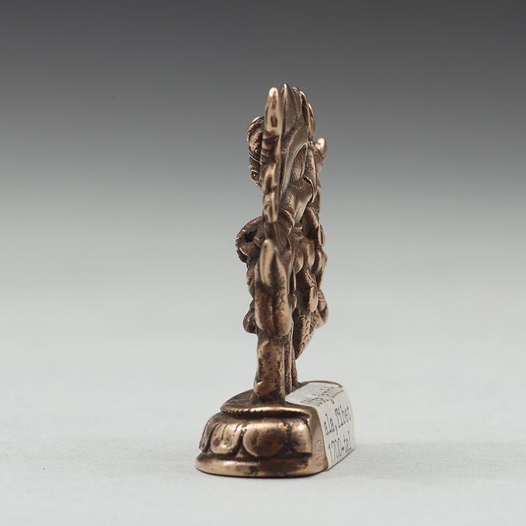 A copper alloy figure of Sita Jambhala, presumably 18th Century.