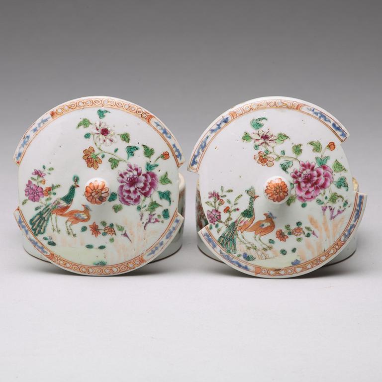 A pair of famille rose 'double peacock' condiment dishes, Qing dynasty, Qianlong (1736-95).