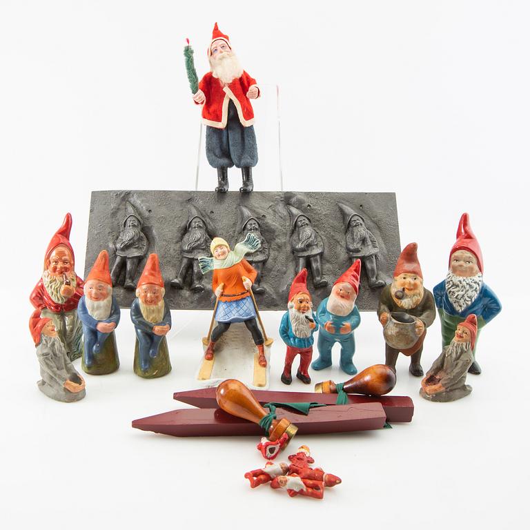 A collection of gnomes and lacquer sticks with seals 19 dlr first half/mid 20th century.
