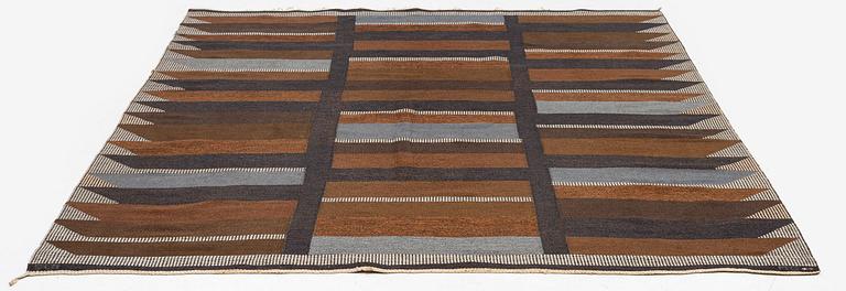 Margareta Grandin-Nettles, a flat weave carpet, c. 305 x 250 cm, signed GLH MG.