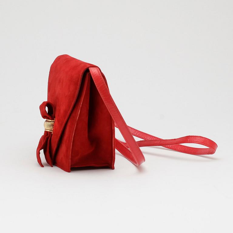 CHARLES JOURDAN, a pair of red suede pumps with matching shoulder bag.