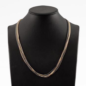 Collier, troligen Ole Lynggaard, sex rader, guld och silver.