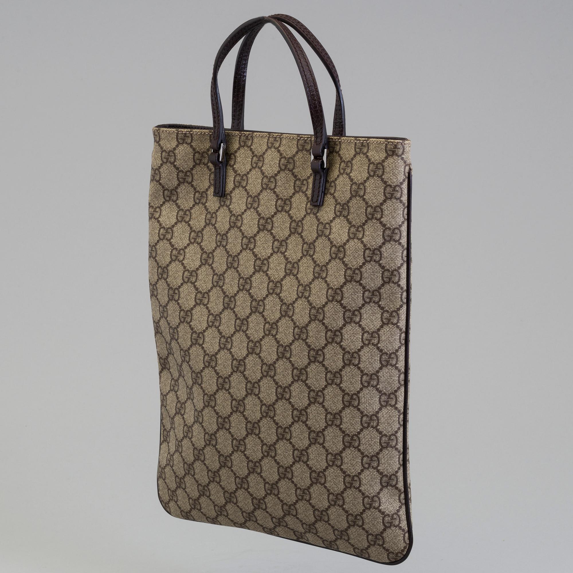 GUCCISSIMA PVC TOTE BAG BY GUCCI.
