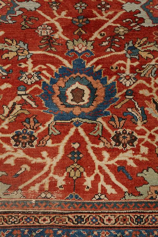 A carpet, an antique Mahal, Ziegler pattern, ca 371,5-374,5 x 265-266 cm (as well as a little flat weave at one end).