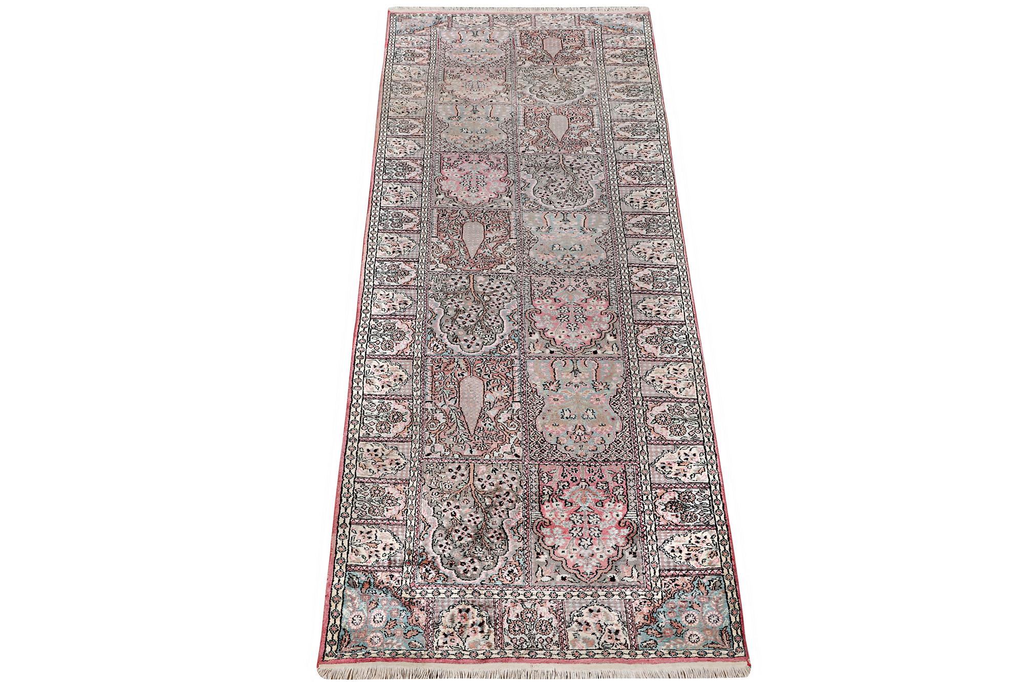 A Kashmir runner carpet, silk, c. 364 x 97 cm.