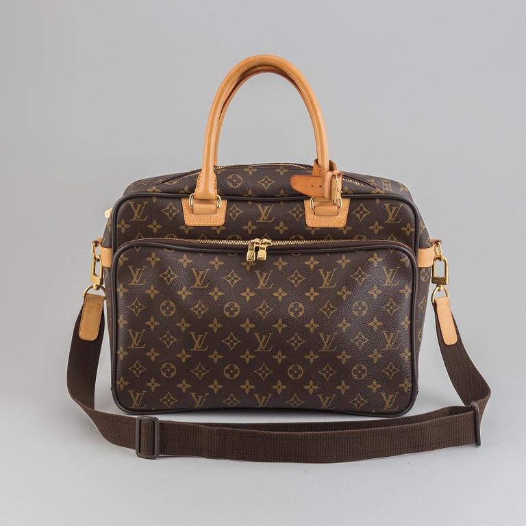 Louis Vuitton, a monogram canvas carry on bag.