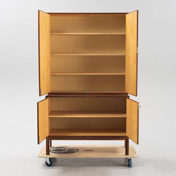 A teak veneered cabinet, 1960's.