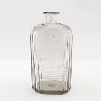 Flaska, glas. Troligen Skånska glasbruket, 1700-tal.
