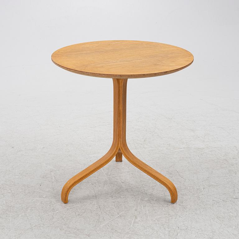 Yngve Ekström, a 'Lamino' armchair with ottoman and sidetable, Swedese, Sweden, 21st century.