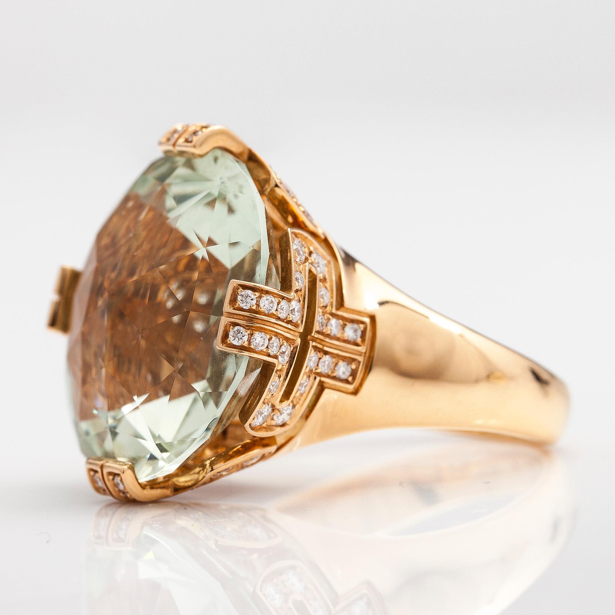 BULGARI, An 18K gold ring "Parentesi" with a green quartz and ca. 0.70 ct of  brilliant cut diamonds in total.