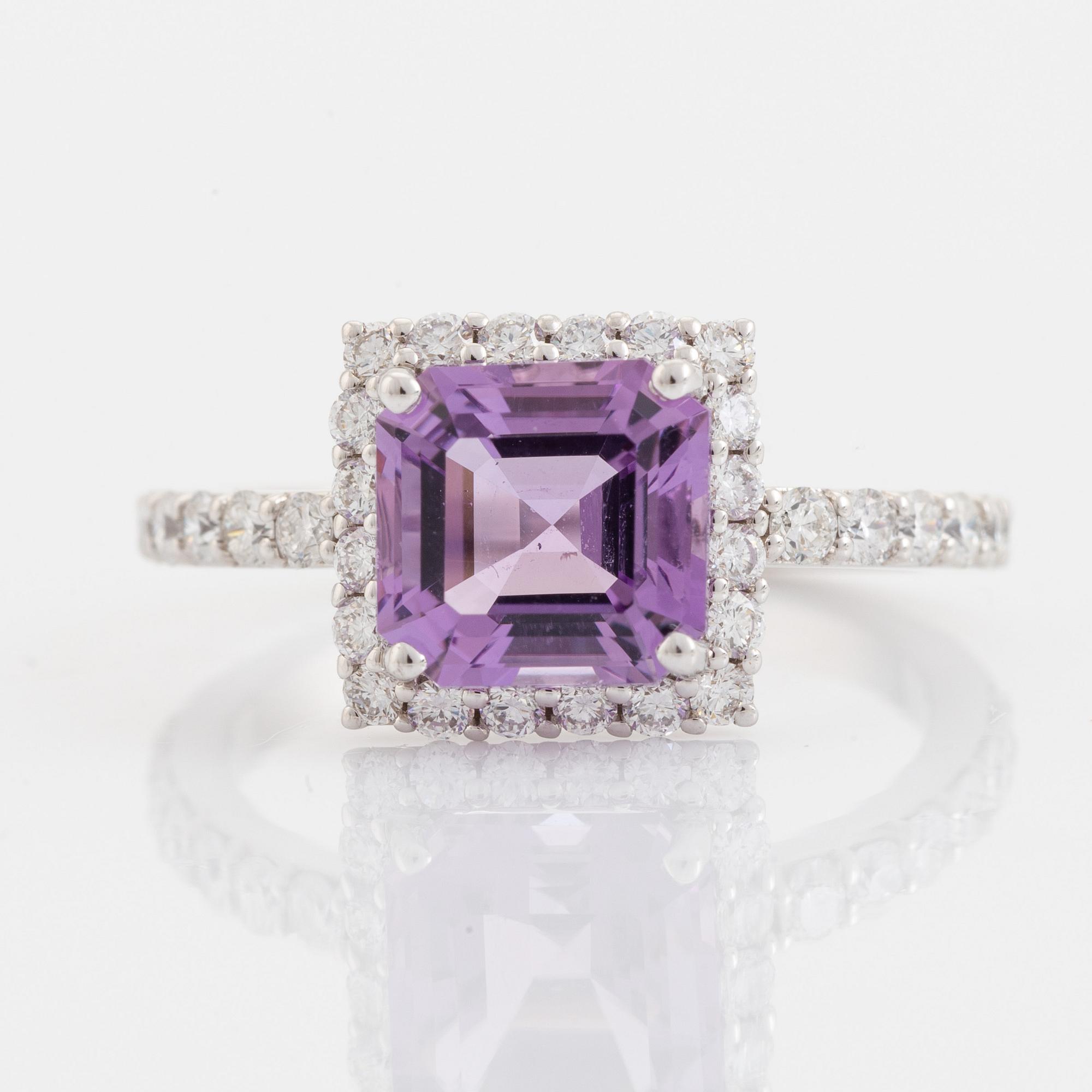 Amethyst and brilliant cut diamond ring.