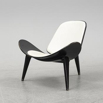 Hans J Wegner, a 'The Smiling Chair/CH07' easy chair from Carl Hansen & Søn, Odense, Denmark.