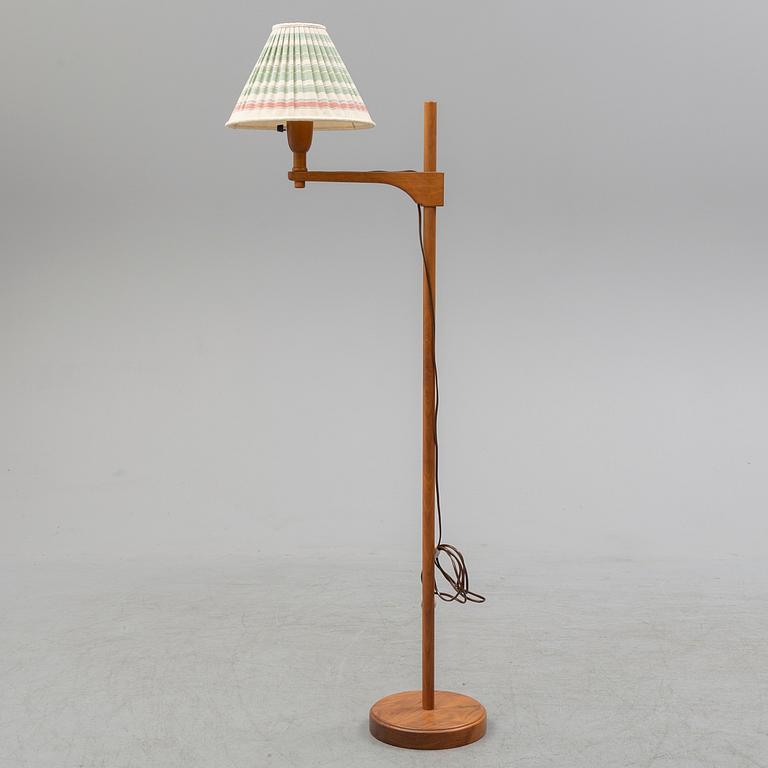 A 'Staken' floor light by Carl Malmsten.