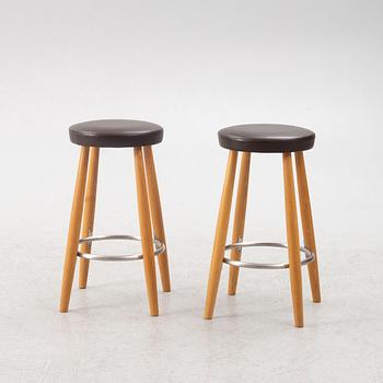 Hans J. Wegner, a pair of bar stools, CH 58, Carl Hansen & Son, Denmark, 21st century.