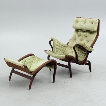 Bruno Mathsson, a 'Pernilla' armchair with ottoman, Dux.