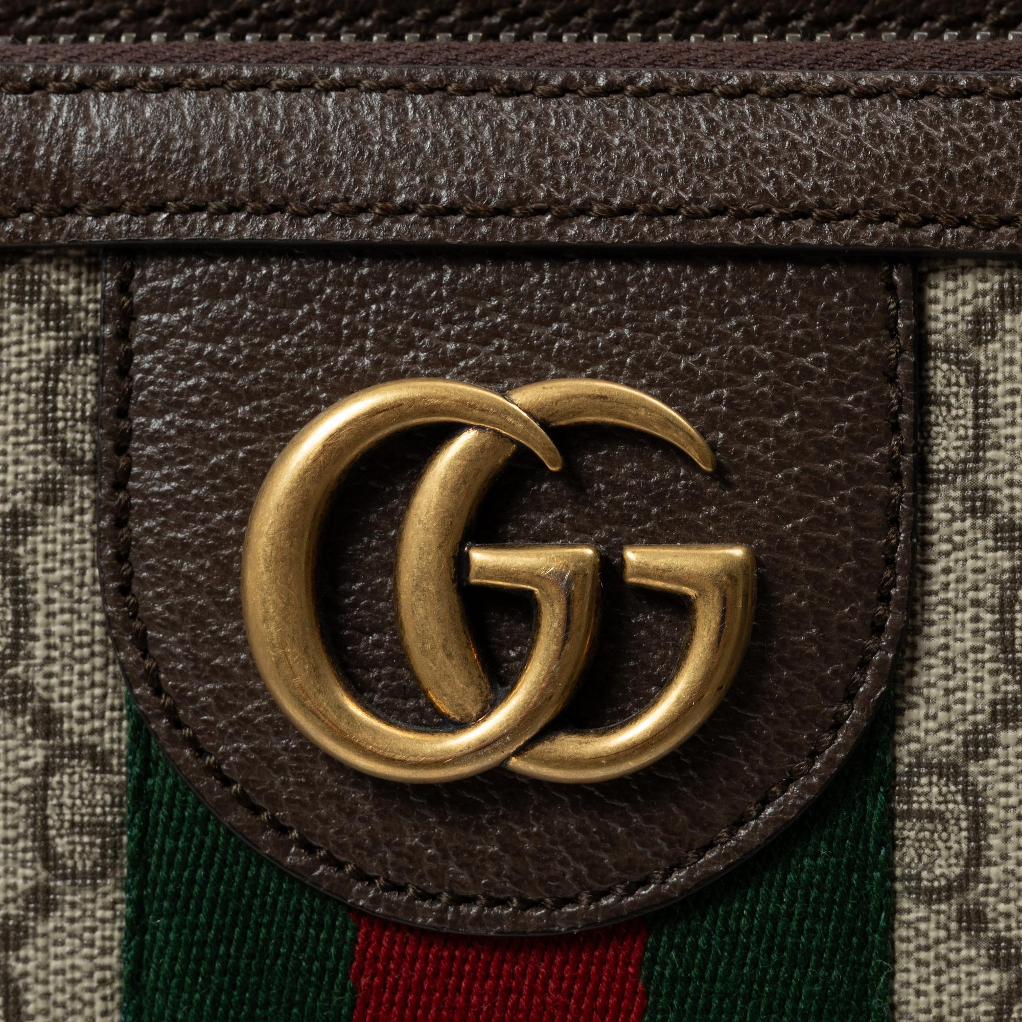 Gucci, suitcase / cabin bag.