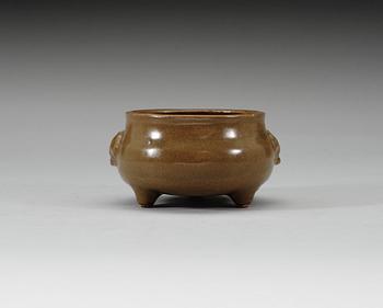 A teadust tripod censer, Qing dynasty, Qianlong (1736-95).