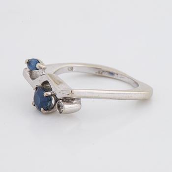 Navette and oval sapphire and diamond ring.