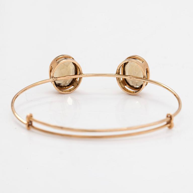 A 14K gold bangle with smoky quartz. Westerback, Helsinki, Finland 1957.