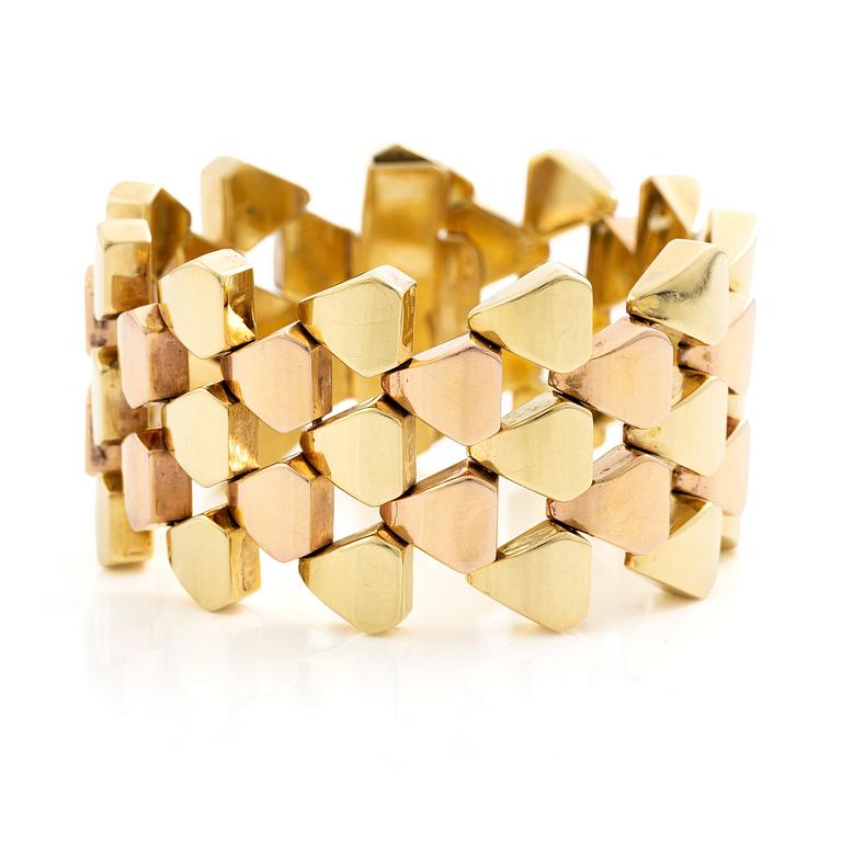 A bracelet 14K gold in two colours.