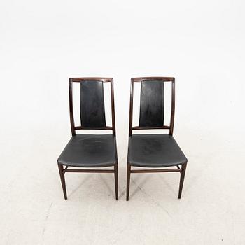 A table and four chairs in lacquered mahogany by David Rosén, "Triva-diné", middle of the 20th century.