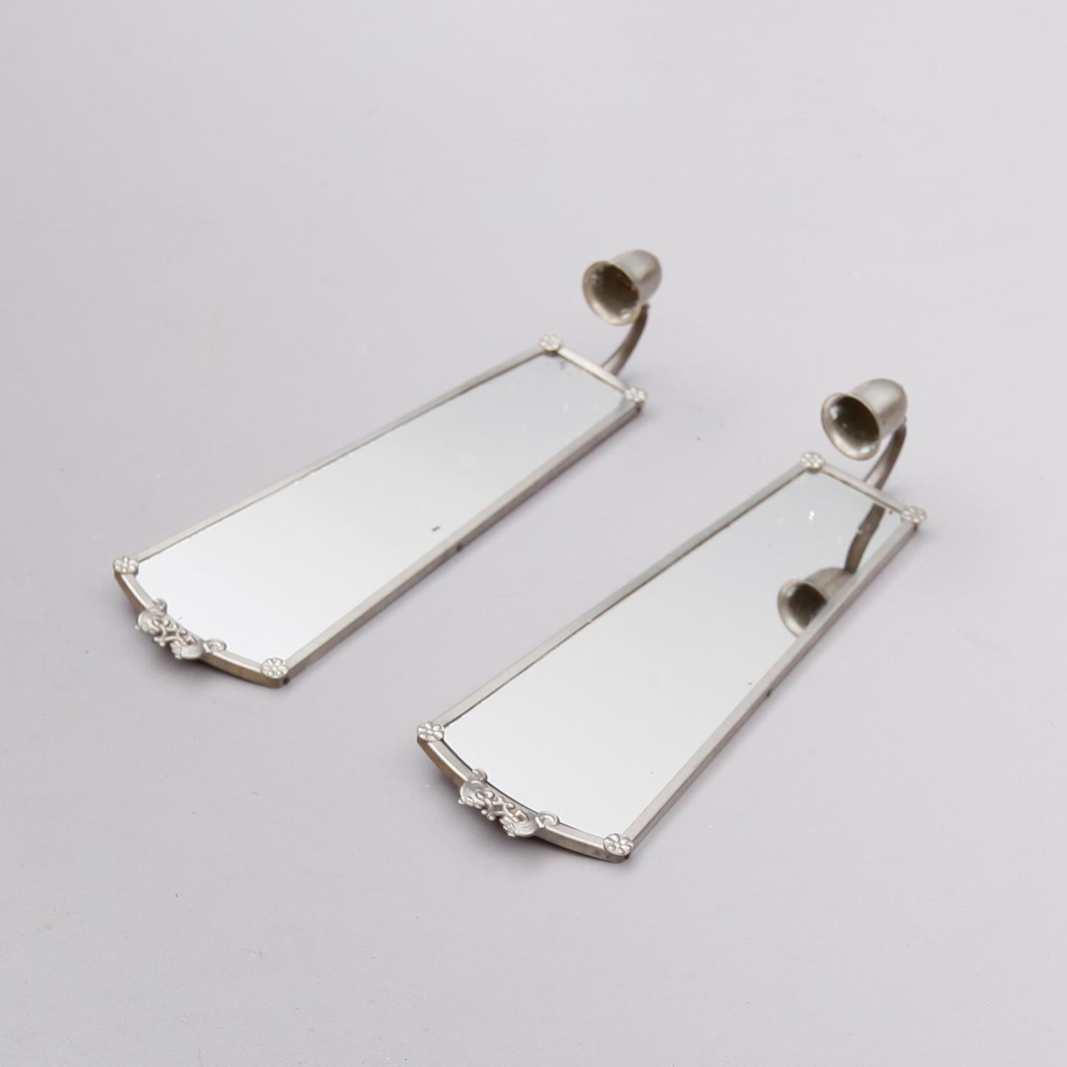 SPEGEL SAMT SPEGELLAMPETTER, 1 par, tenn, 1930-/40-tal.