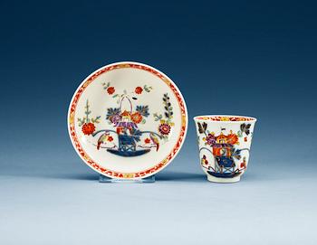 752. A Meissen 'Tischen müster' cup with saucer, ca 1735.