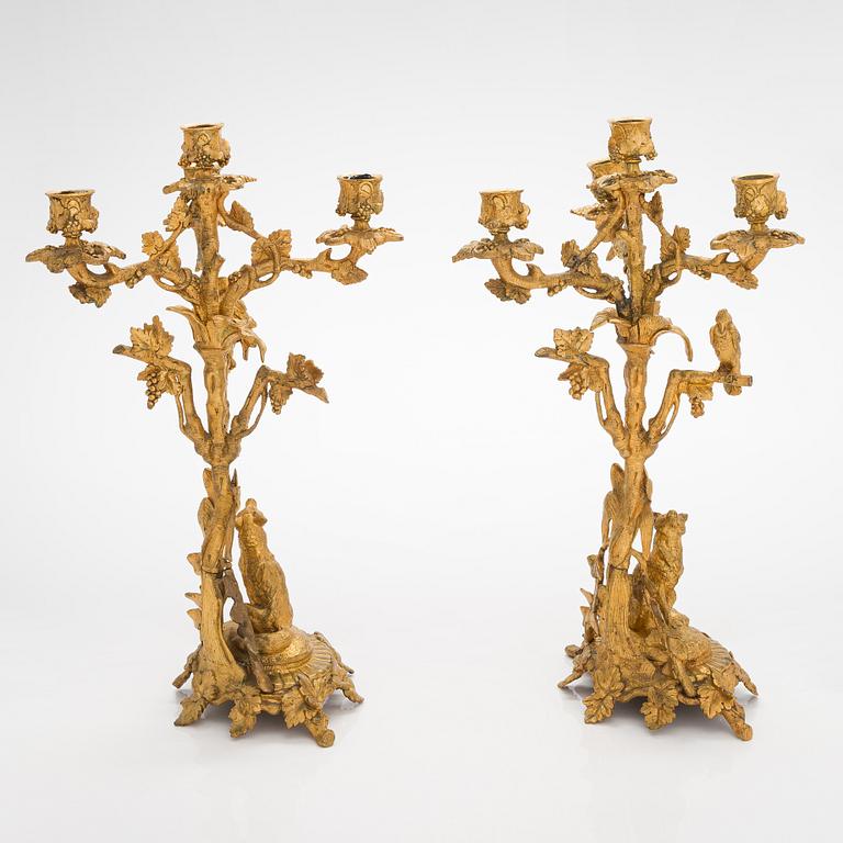 A pair of gilt brass candelabra from the latter half of the 19th century.