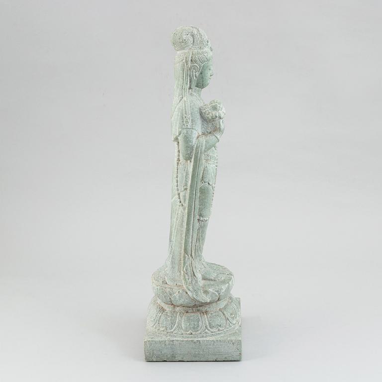 A carved Chinese stone figurine of Guanyin, first half of the 20th century.