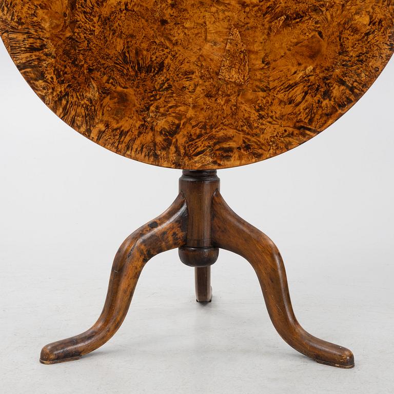 A burr alder tilt-top table by J. Sjölin (master 1767-85).