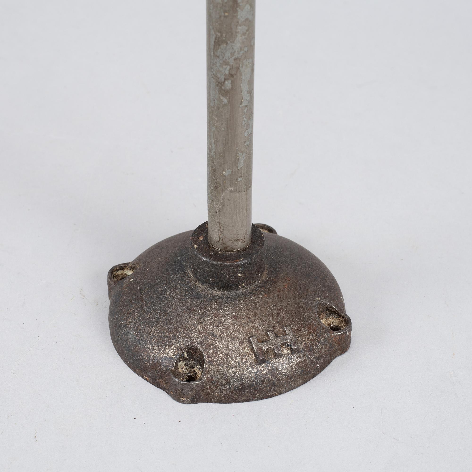 A set of four metal wall lights, first half of the 20th century.