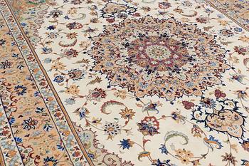 A carpet, Tabriz, ca 385 x 247 cm.