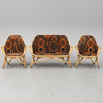 A sofa and two easy chairs, 1960s.