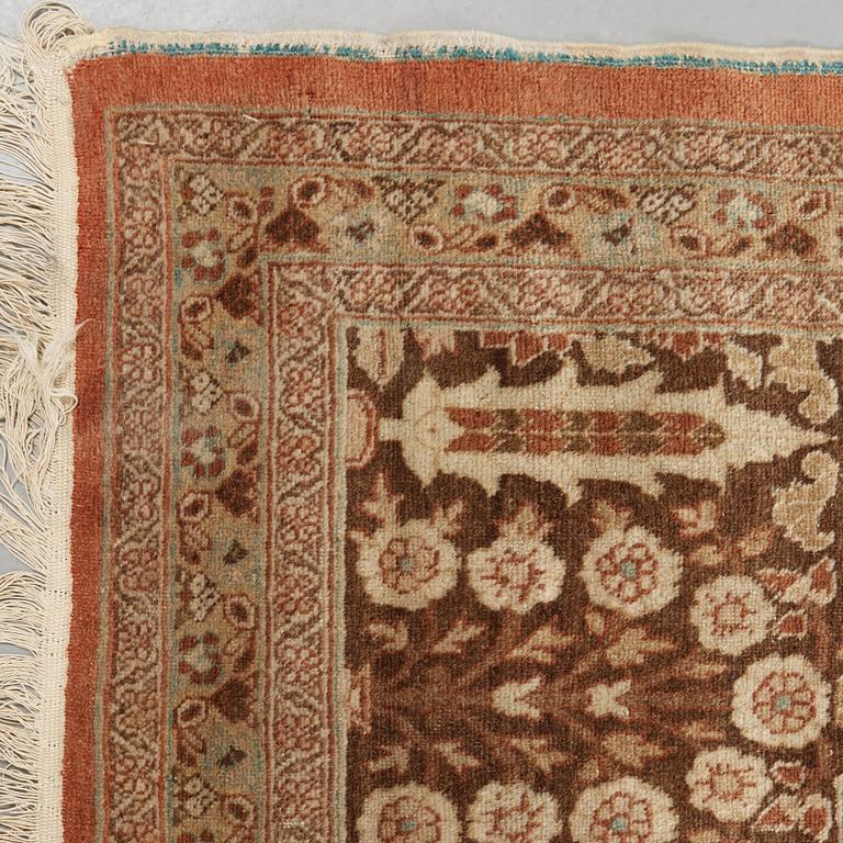 A CARPET. An antique Tabriz. 426 x 311 cm.