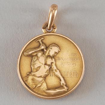 JETONG, guld, av Alfred Thielemann, S:t Petersburg 1908-1917. Orginalask märkt FABERGÈ.